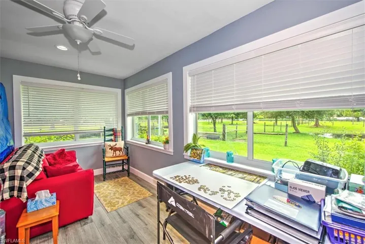 Game room featuring ceiling fan and light wood-type flooring