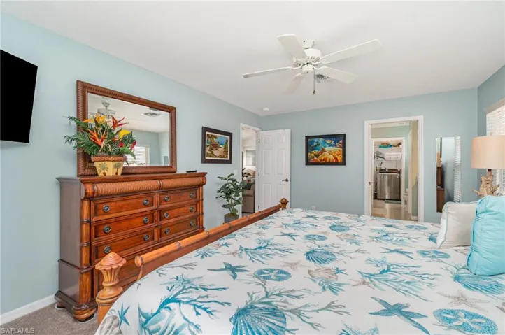 Primary Bedroom with carpet flooring and ceiling fan