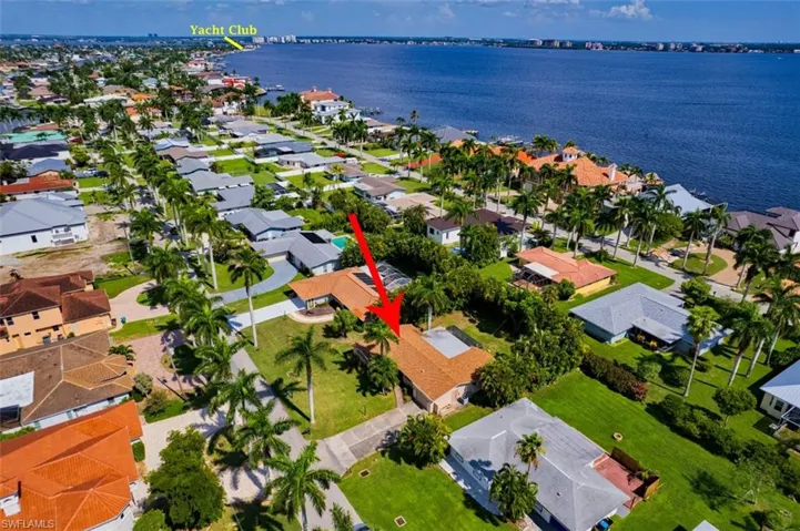 Aerial view with a water view and a residential view