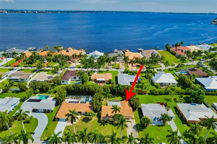 Bird's eye view with a residential view and a water view