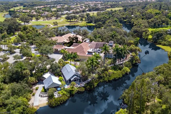 Drone / aerial view featuring a residential view and a water view