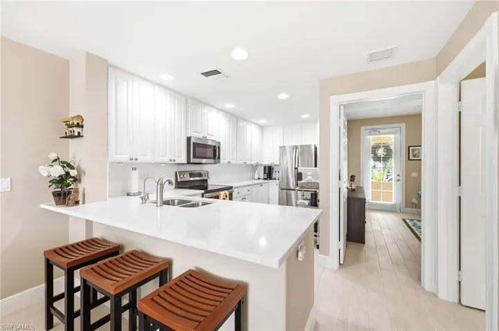 Kitchen Island with stainless steel applicances
