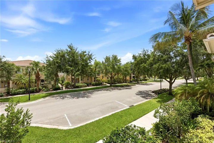 Street view with parking in front of the property