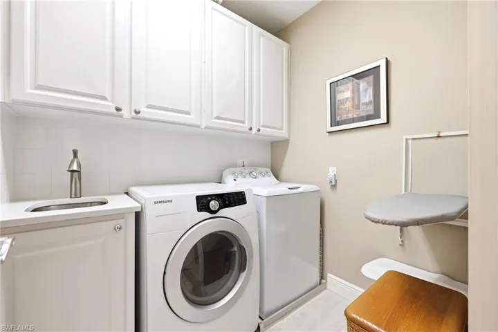 Laundry room with washer and dryer