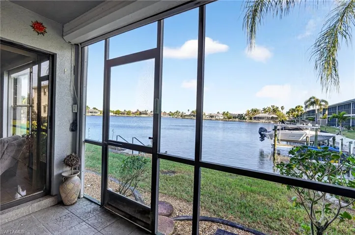 Water view with a dock