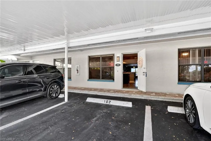 Garage featuring parking