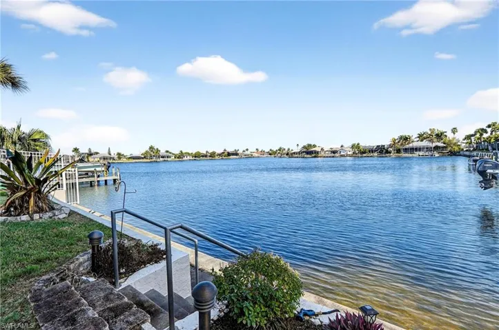 Water view with a boat dock