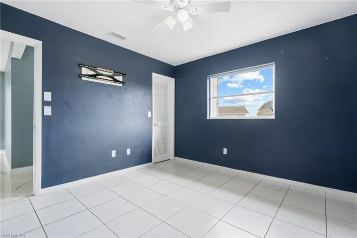 Spare room featuring ceiling fan