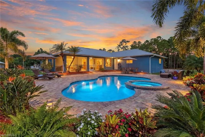 Virtually added!  Enjoy sunsets in your backyard in this relaxing pool / spa featuring a patio area and outdoor dining area