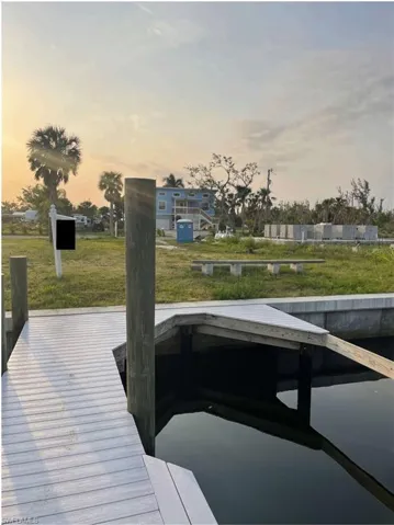 Dock area featuring a lawn