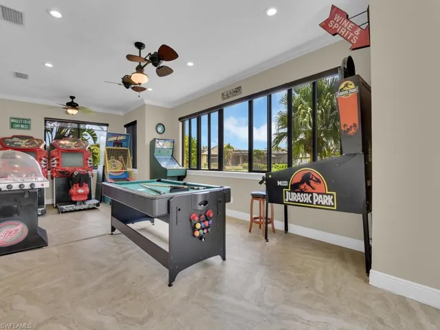 Recreation room with billiards table, crown molding, ceiling fan, baseboards, and recessed lighting