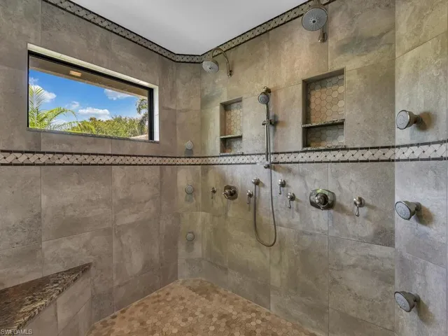 Full bath with tiled shower