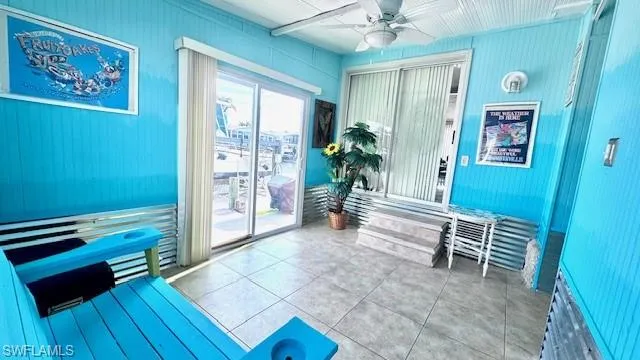 Lanai back of home with entrance to home or to waterfront patio.  This room could easily be transformed into a den/office or even another bedroom