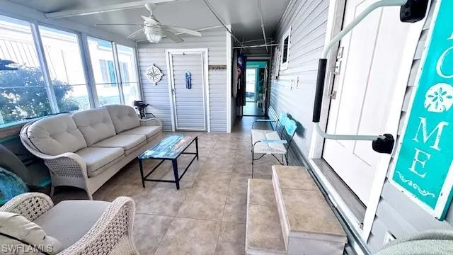 Lanai with sliding windows, Shed with walkthru to another Lanai Area back of home.