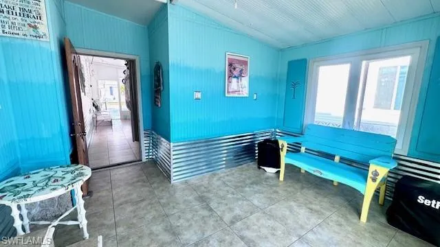 Lanai back of home with entrance to home or to waterfront patio.  This room could easily be transformed into a den/office or even another bedroom