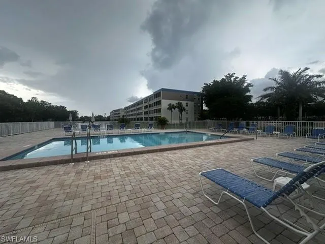 Community pool featuring a patio area