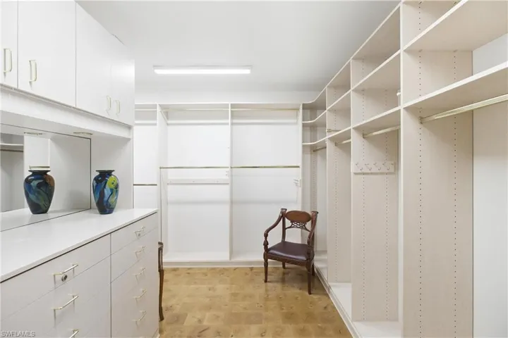 Spacious closet featuring light flooring