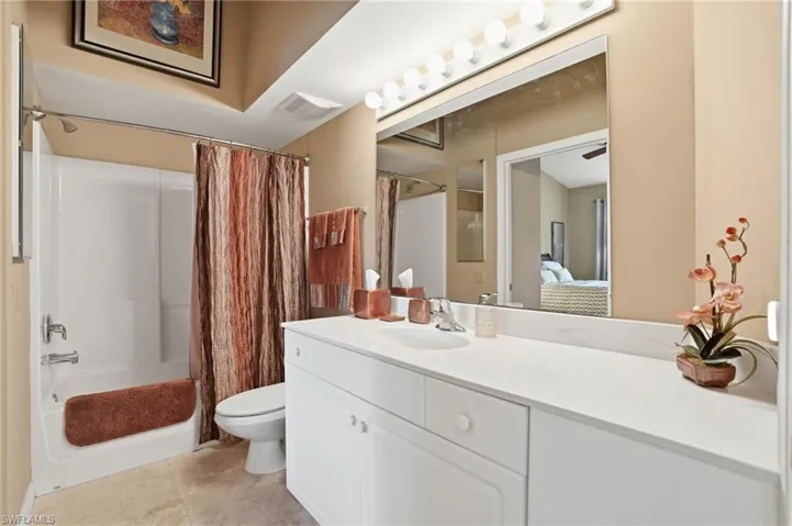 Guest bathroom with shower/tub combo.