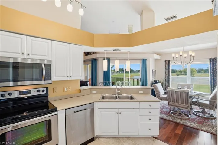 Cook with a view out to the lanai and golf course beyond.