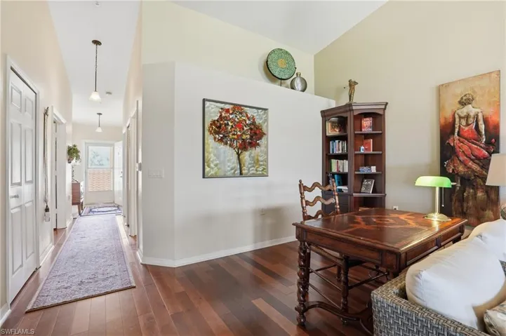 Dark hardwood floors run through the home.