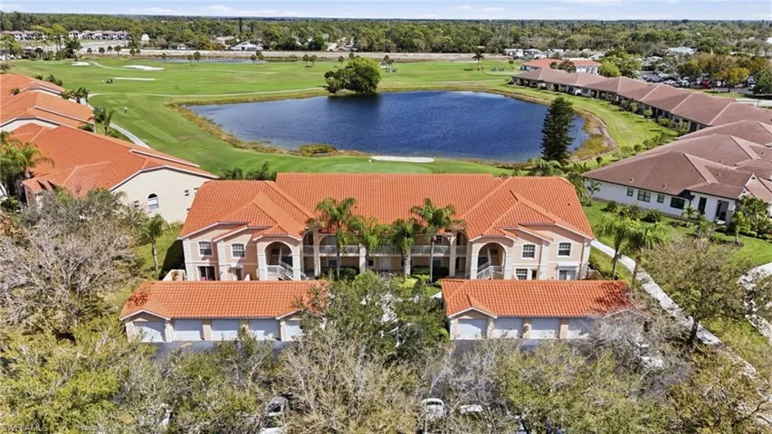 Beautifully maintained building in Bonita Fairways, complete with your own detached garage.