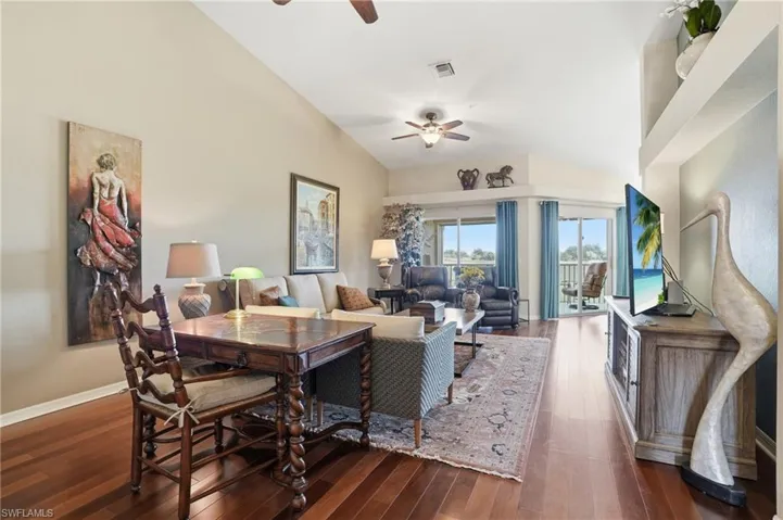 Inviting sitting area with volume ceilings and plenty of space to relax or entertain.