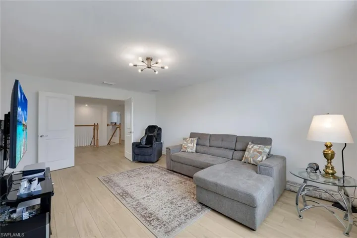 upstairs- large bonus room/den/game room