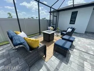 View of patio with glass enclosure