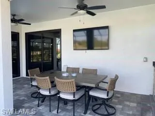 View of patio featuring ceiling fan and outdoor dining space