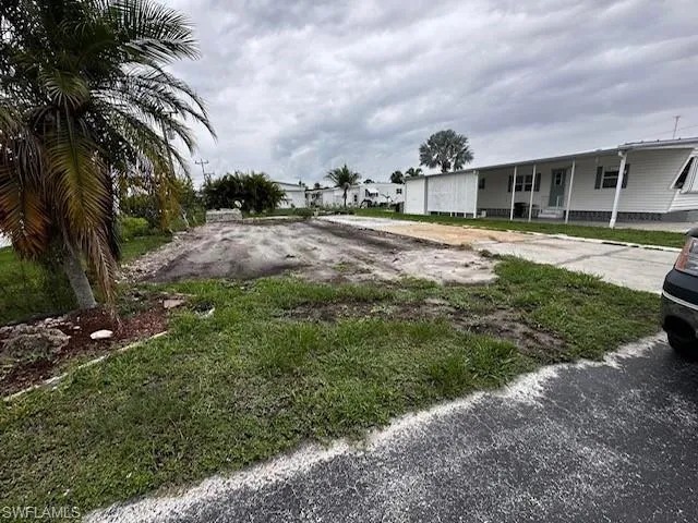 View of yard with a porch