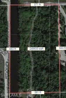 Aerial overview of property's location with property parcel outlined