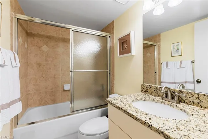 Updated bathroom with shower/tub combo