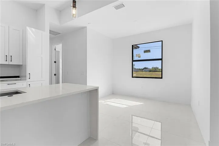 Empty room with visible vents