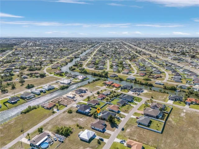 Drone / aerial view featuring a residential view and a water view