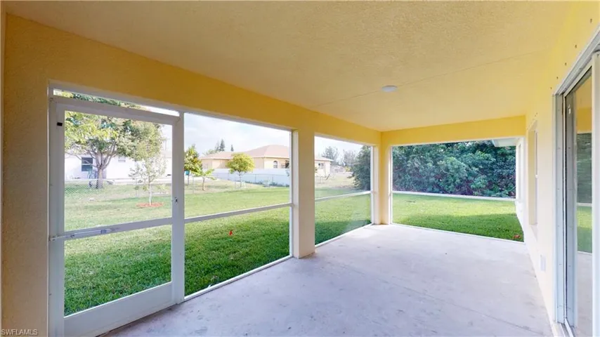 Unfurnished sunroom with plenty of natural light