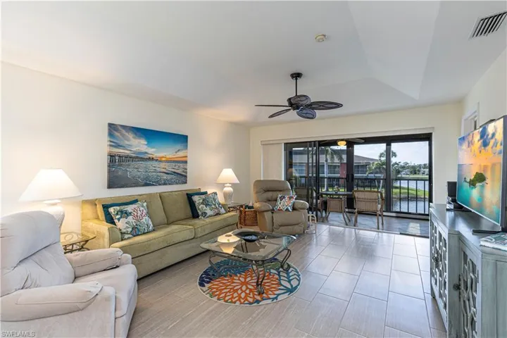 Living room coffered ceiling and great view of lake