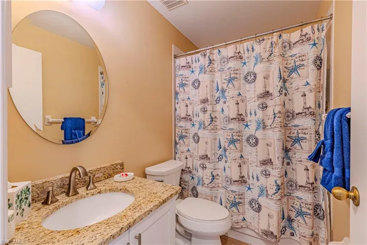 Bathroom with a shower/tub combination