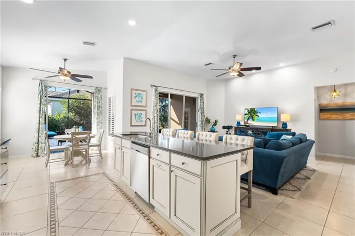Custom cabintery. Beautful tile floors throughout the home. Access to your lanai from both the living area and the breakfast nook. Volume ceilings!