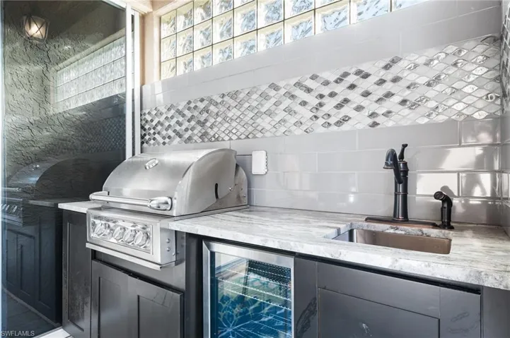 BROIL CHEF grill, refrigerator, sink  with a granite countertop! Everything you need for outdoor entertaining!