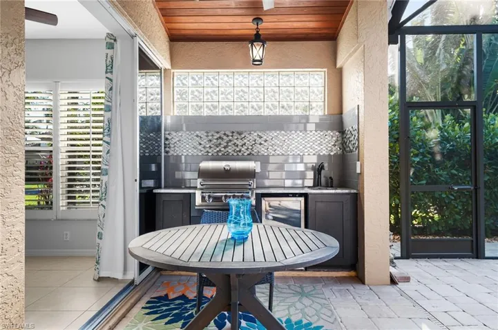 Fabulous outdoor kitchen. Great backsplash and listello.
