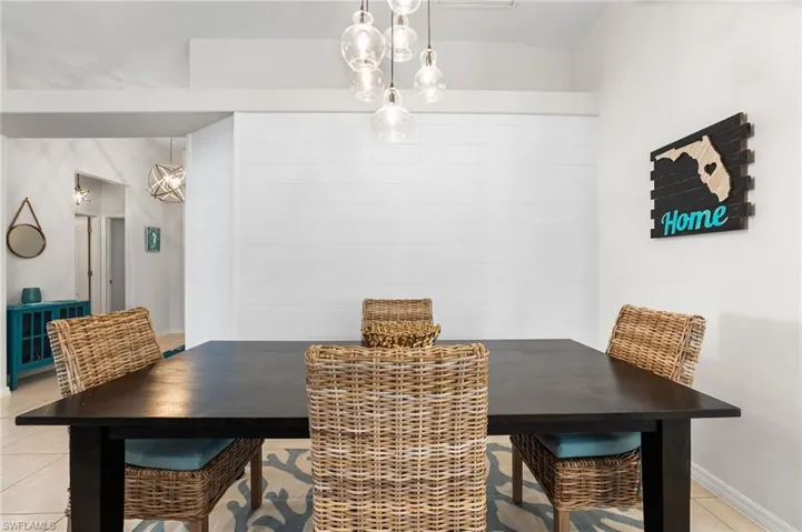 Beautful ship lap wall in your dining area. New chandelier.