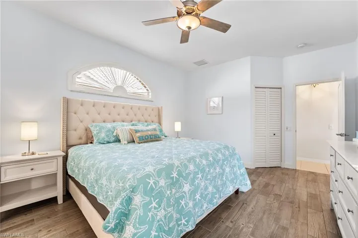 Lots of natural light pours into this room. Tile floors and a walk in closet.