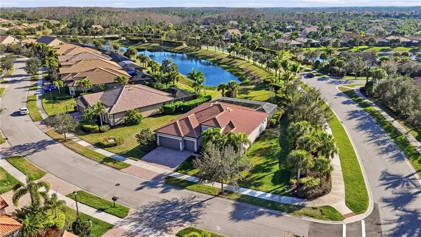 Aerial view of residential area with a large body of water