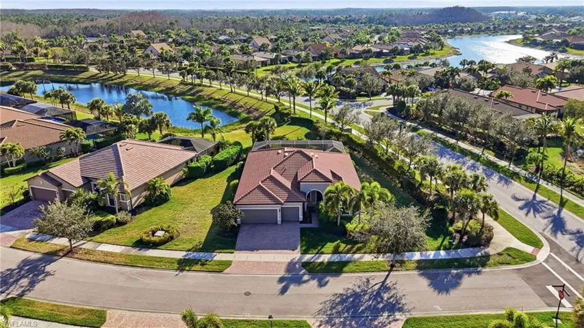 Aerial view of residential area with a large body of water