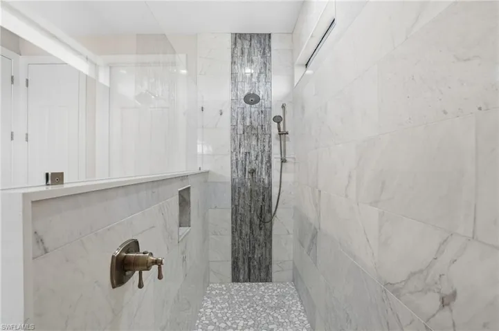Bathroom featuring a walk in shower