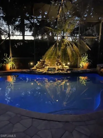 Pool with glass enclosure