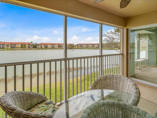 Back Screened Balcony w/ Lake & Fountain Views