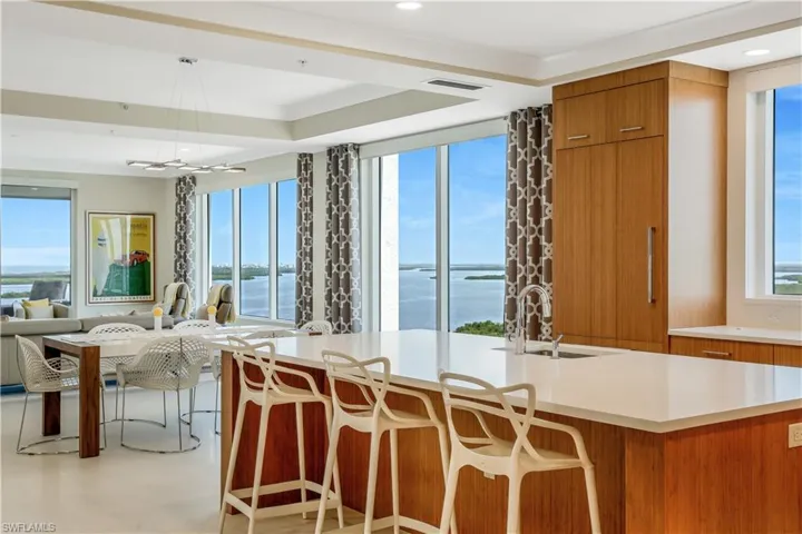 Custom bamboo "Crystal" cabinets in kitchen,master bathroom, powder room and guestbaths, installed by Raymond Design of Naples.