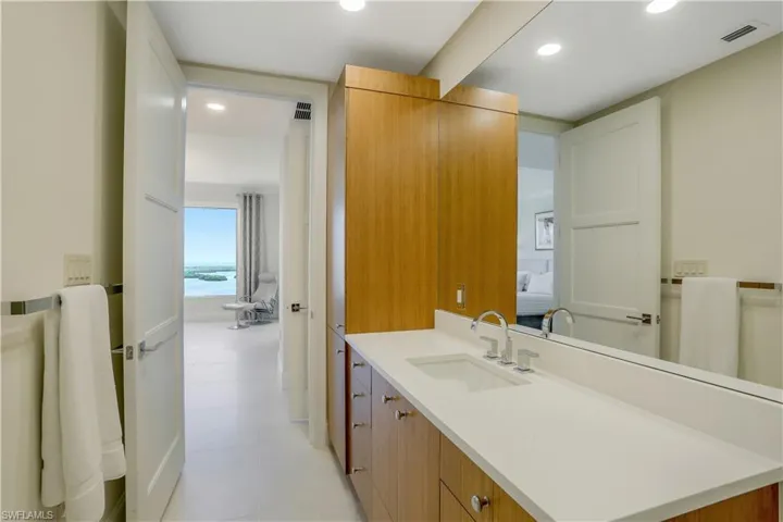 Unique, custom his and hers bathroom design.You will both have private vanity, sink, toiletand HUGE closet with custom built-ins.