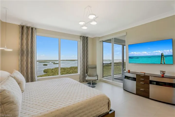 The master bedroom suite is spacious andcomfortable with plenty of room for rest andlounging.